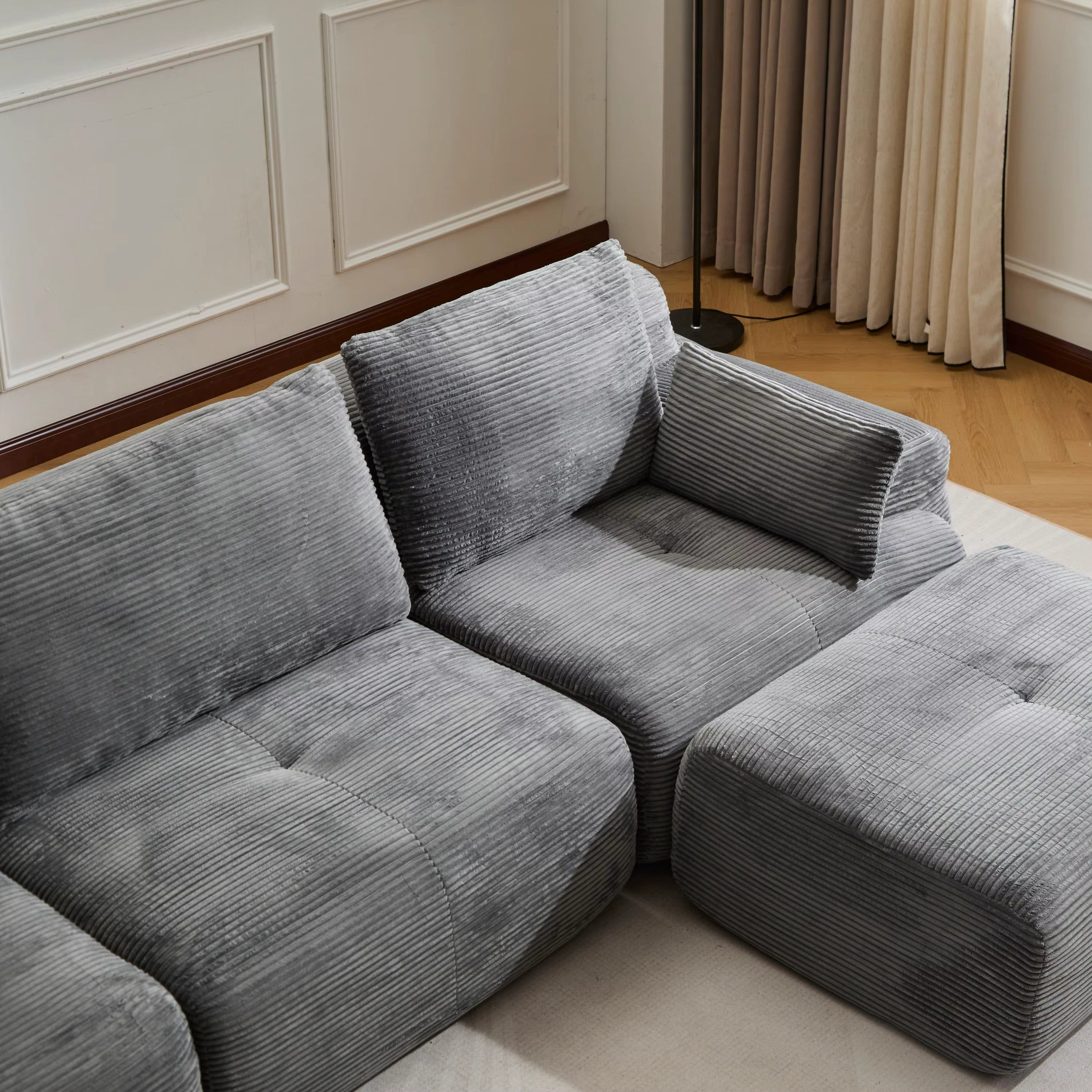 Canapé Mellow en velours côtelé gris en forme de L